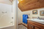 Upstairs full bathroom with a shower tub combo